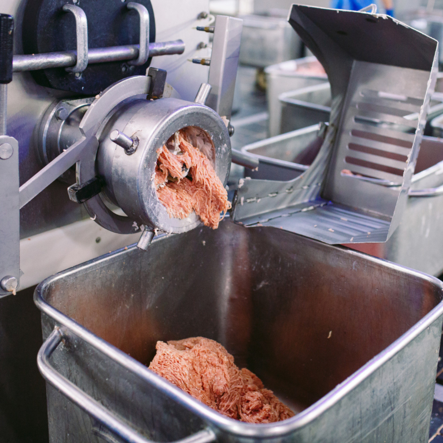 Production machine grinding and mincing meat
